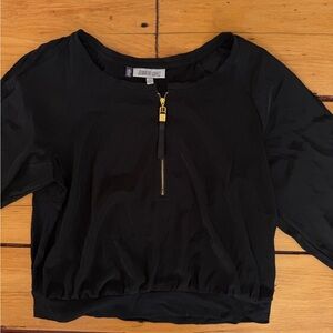 Jennifer Lopez Black Crop Top with Gold Zipper